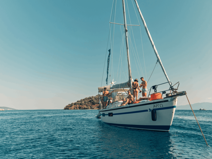 Small group sailing cruise in Nafplio with guests having fun onboard